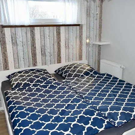 Luett Hus An De *